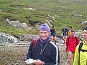 A midge protected runner prepares for the boat crossing