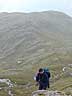 Heading into a strong wind high above Glen Shiel