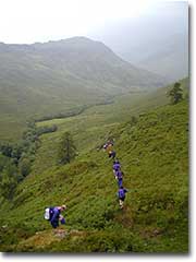 competitors are starting to arrive in camp after a hard day on the hills