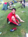 Tim Martin with the pair of shoes donated to him by Martin Stone after his fell apart on Day 1