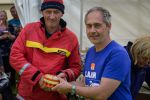 Callum Whiteford receives the proceeds of the beer sales on behalf of Arrochar Mountain Rescue.