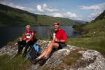 Chris Burden and Hank Van Rossun take a rest by Loch Arkaig