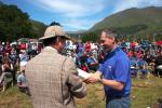 Martin Stone presents a bottle of whisky to Alistair Gibson, Glenfinnan Estate manager, who helped with organisation and presented the prizes