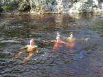 Mid camp facilities include a swimming pool. Competitors cooling off in the River Tilt