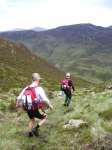 A team arriving at the first control on the B course