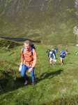 David Fussell, a B course competitor, joins the crowd climbing above Glen Loch