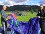 Mark Ridley and Chris Cann try putting their tent up for the first time - 'I've read the instructions', said Chris