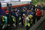 Elite and A course competitors board the train at Strathcarron for a ride up the glen to their start