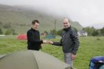 Stuart Douglas (L) and Peter gold (R) share out the tent pegs.