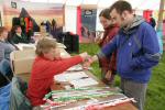 At registration, Anne Leaney attaches the dibber to Robert Eadon, partnered by Ceri Stewart