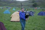 Niall Watson, the piper, wakes the event centre campers at 5.15am.