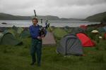 Watson rouses campers on the shore of Loch Glencoul with the bagpipes