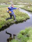Hamilton Semple jumping a stream