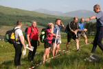 Controller Andy Spenceley directs teams at the Bridge of Orchy start