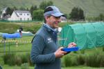 Race Director Martin Stone enjoying his porridge at mid camp