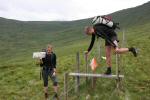 A Novice team negotiate an electric fence – site of their third control