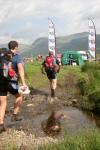 Runners approach the Day 1 finish