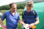 Race Director Martin Stone discusses the Elite course with Mark Hartell at the Day 1 finish