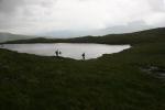 A team approaches a lochan control shared by A and B teams