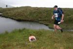 A team approaches a lochan control shared by A and B teams