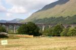The Glenfinnan Viaduct forms a backdrop to an empty event centre camping field