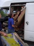 Martin (organiser) gets all the glamorous jobs - loading the road bikes at Glen Feshie