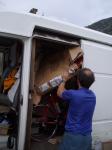 Martin (organiser) gets all the glamorous jobs - loading the road bikes at Glen Feshie